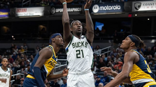 Holiday leads way as Bucks top Pacers, win 7th in row