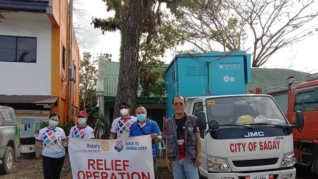 Aid mission eases water, medical problems in Sipalay City