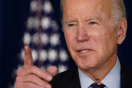 A year after US Capitol siege, Biden blasts Trump’s ‘web of lies’