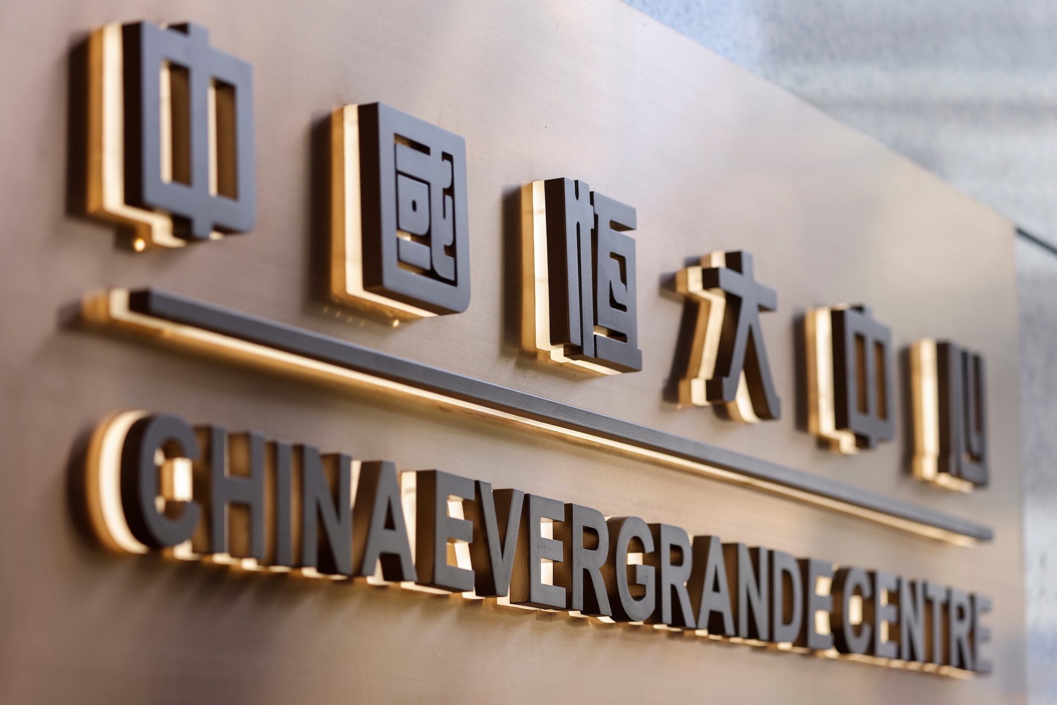 EXPLAINER: What’s next for China Evergrande after missing coupon payments