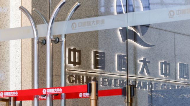 Evergrande, Kaisa cut by Fitch to default after missed payment deadlines