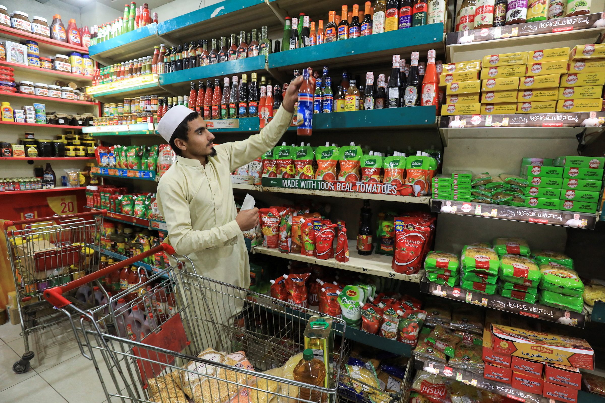 Pakistanis squeezed by inflation face more pain from tax hikes