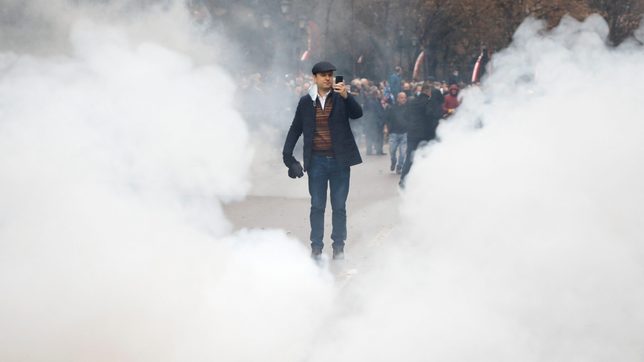 Albanian police fire teargas as protesters storm party offices