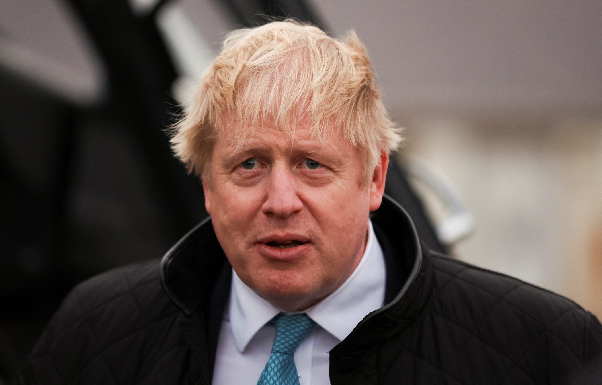 Boris Johnson arrives back in Britain to attempt rapid political comeback