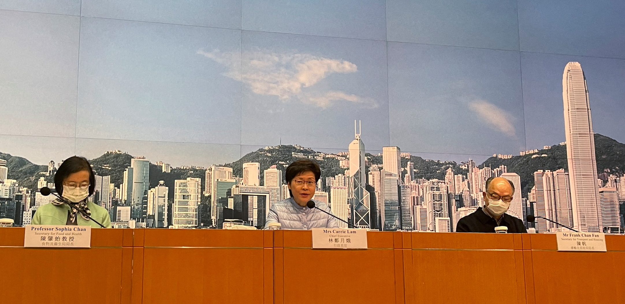 ‘Solemn’ Hong Kong leader ditches mask to show how she feels about COVID-19