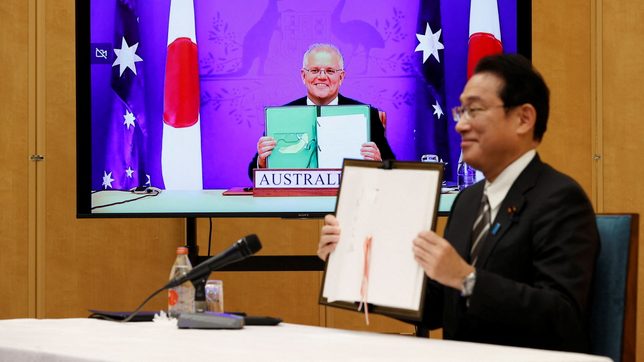 Japan, Australia sign defense cooperation pact