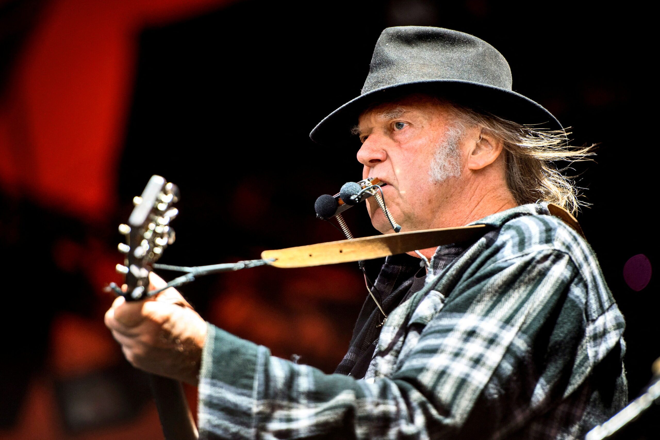 Neil Young takes aim at Spotify CEO, big banks