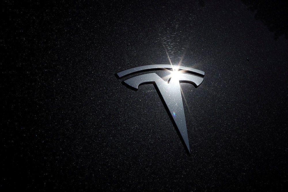 Tesla recalls nearly 54,000 vehicles that may disobey stop signs