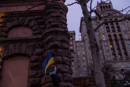 ‘We fear no one’: Ukrainians raise flags to defy Russia invasion fear