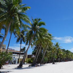 Tourist families flock to Boracay as island opens famous beach