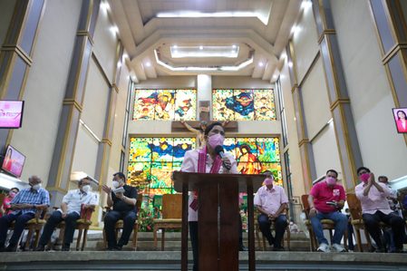 In fight vs Marcos, Robredo taps Church 'machinery' to beat fake news