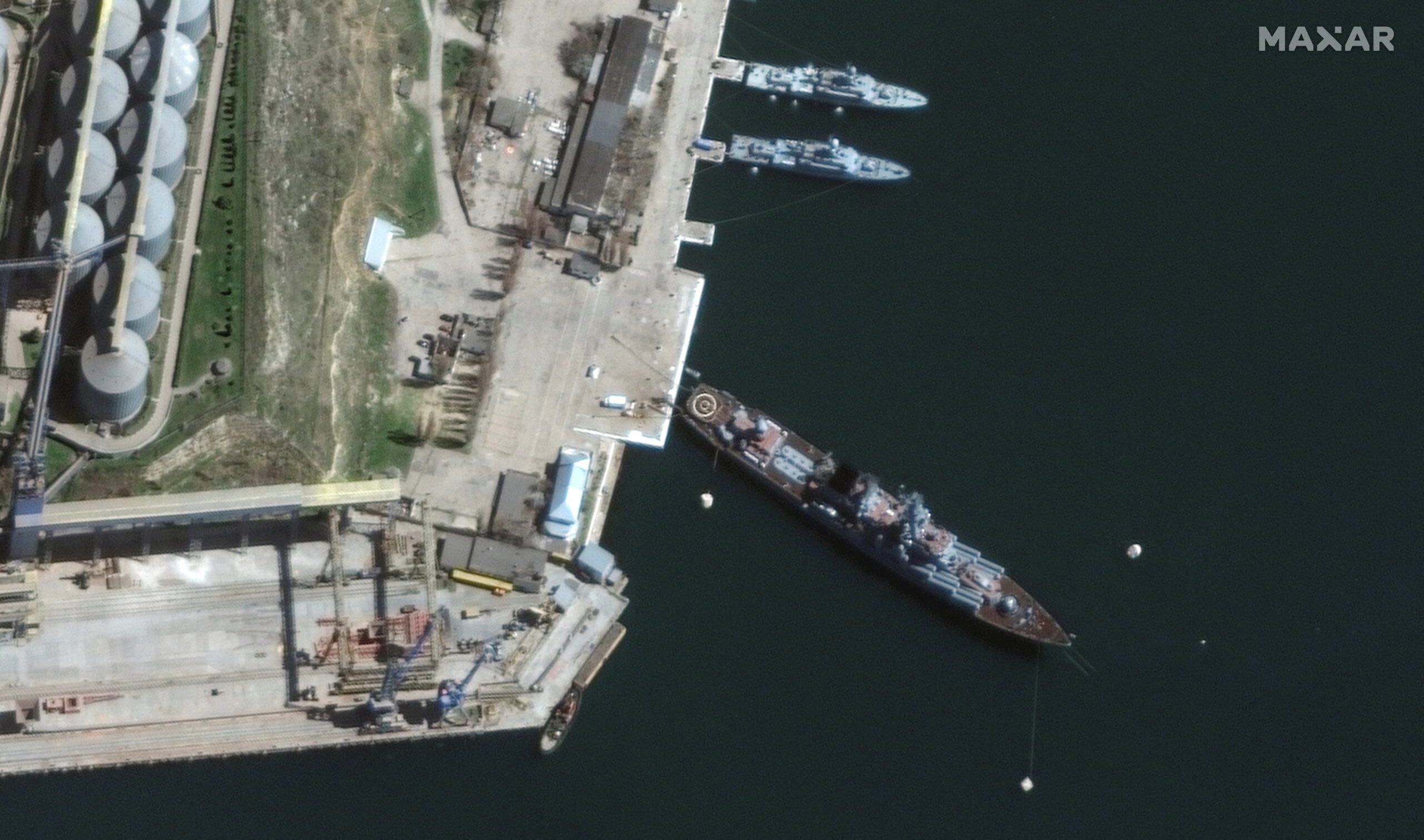 Russia says blast cripples Black Sea flagship, Ukraine claims missile strike