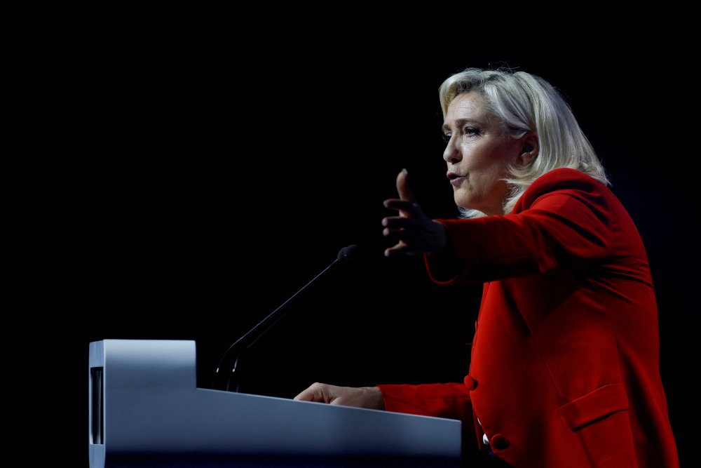 Faced with criticism, Le Pen allies tone down rhetoric on hijab ban