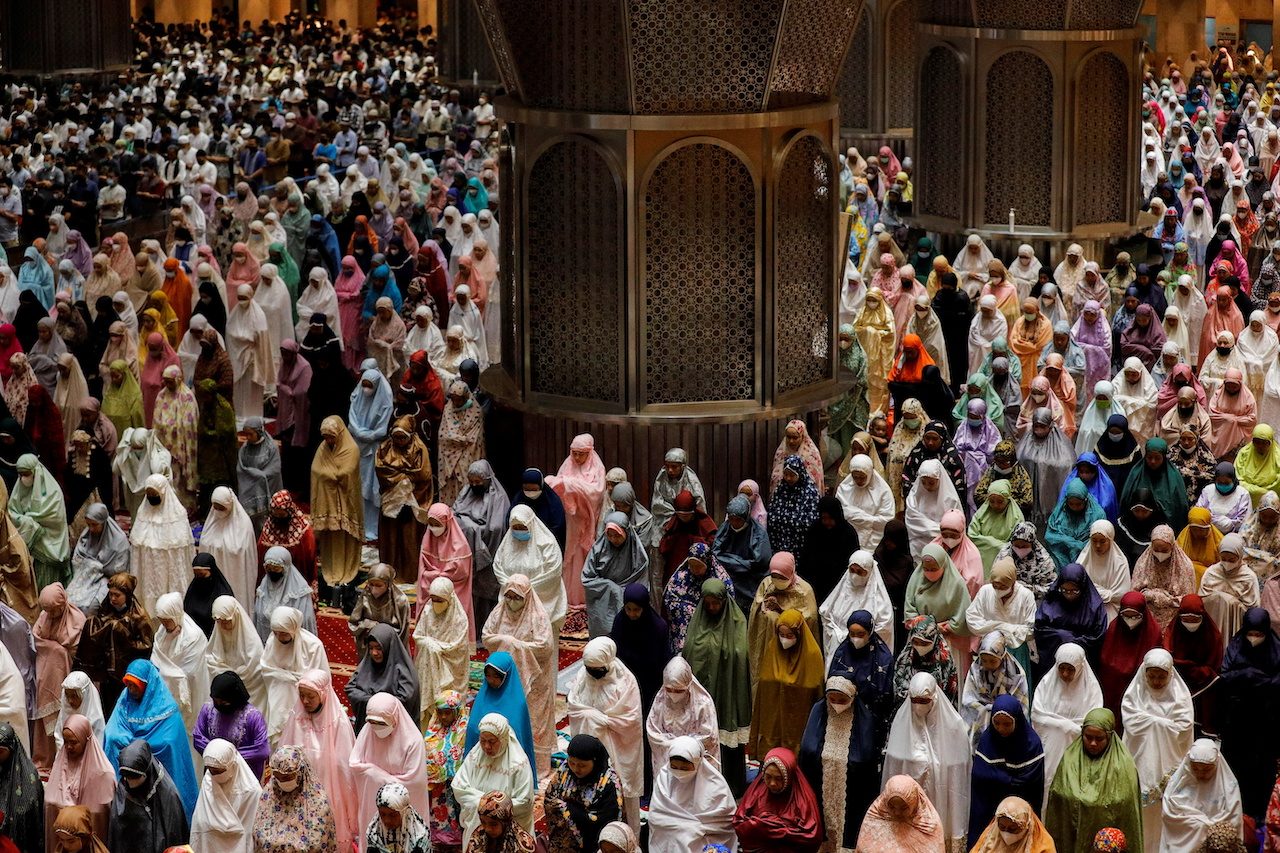 Indonesia greets Ramadan with mass prayer as COVID-19 curbs ease