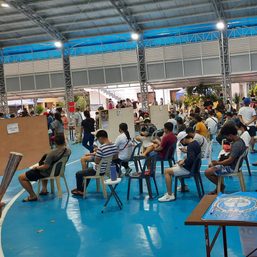 Some Filipino voters insist on securing their vote despite VCM issues, long lines