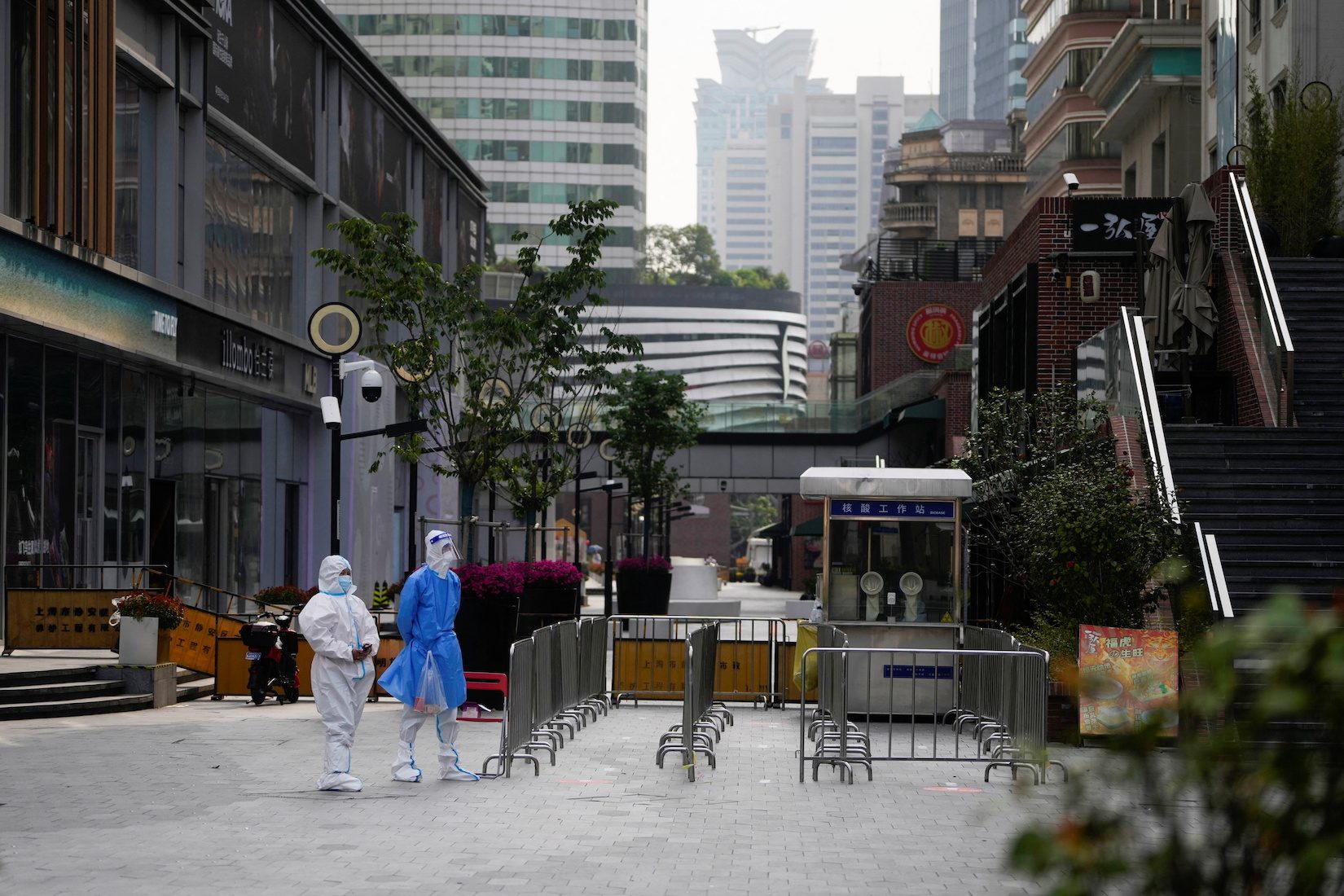 Some in Shanghai get out for a rare stroll; Beijing tightens COVID-19 curbs