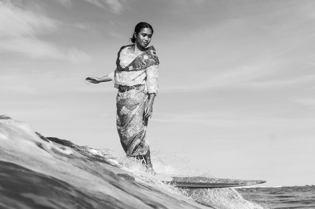 Riding waves in full Filipiniana, these surfers paint images of freedom