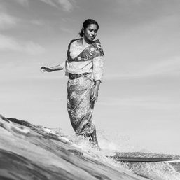 Riding waves in full Filipiniana, these surfers paint images of freedom