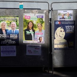 Macron faces tough battle for control of parliament as France votes