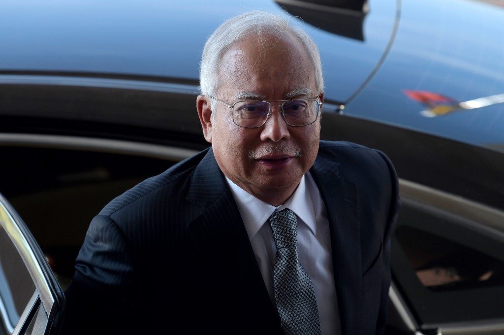 Malaysian ex-PM Najib sentenced to 12 years over 1MDB scandal