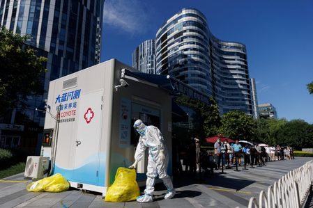 Fresh COVID-19 wave sweeps Asia, New Zealand warns of pressure on hospitals