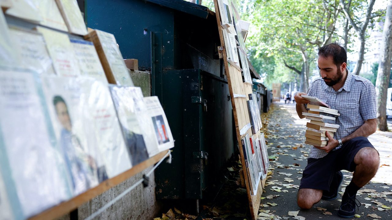 ‘It’s wonderful,’ say riverside booksellers as tourists return to Paris