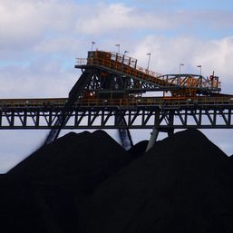 Australia companies split: Miners boom, airlines turn up, retailers slump