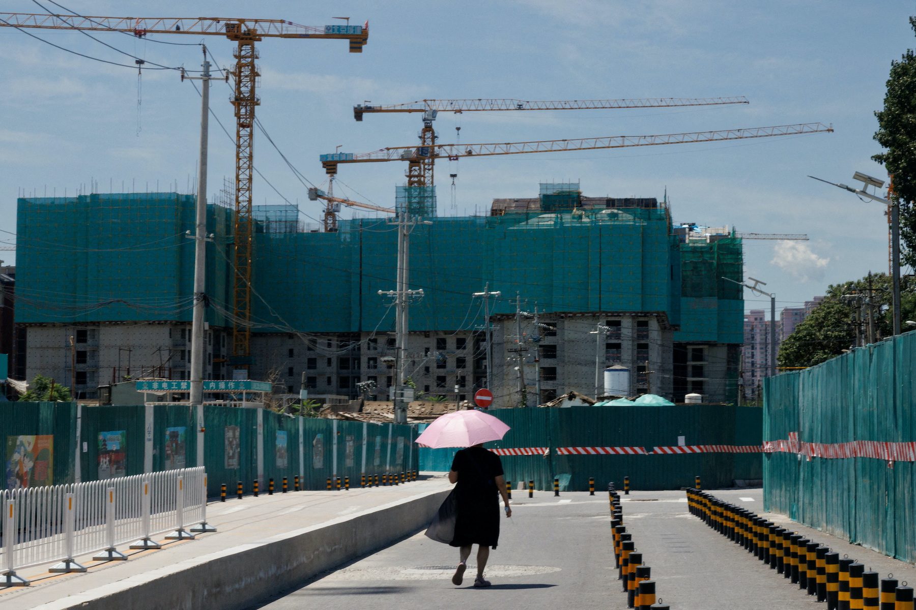In 2 Chinese cities, civil servants told to help offload unsold homes