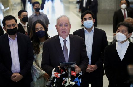 Malaysia pardons board halves sentence of jailed ex-PM Najib, convicted in 1MDB scandal