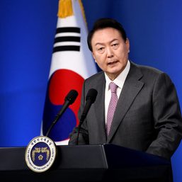 South Korea’s prime minister calls for calm as COVID-19 cases hit new record