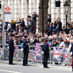Huge crowds follow queen’s funeral in silence and awe