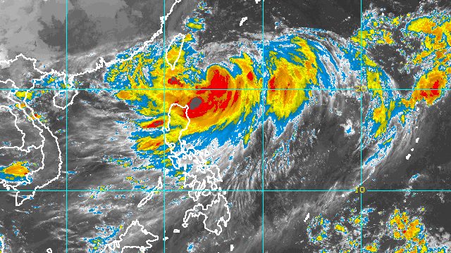 Henry downgraded to typhoon, becomes almost stationary