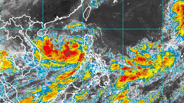 Typhoon Karding slightly weakens while moving away from Luzon