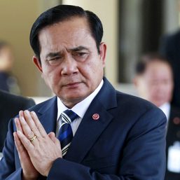 Suspended Thai PM Prayuth says to continue as defense minister