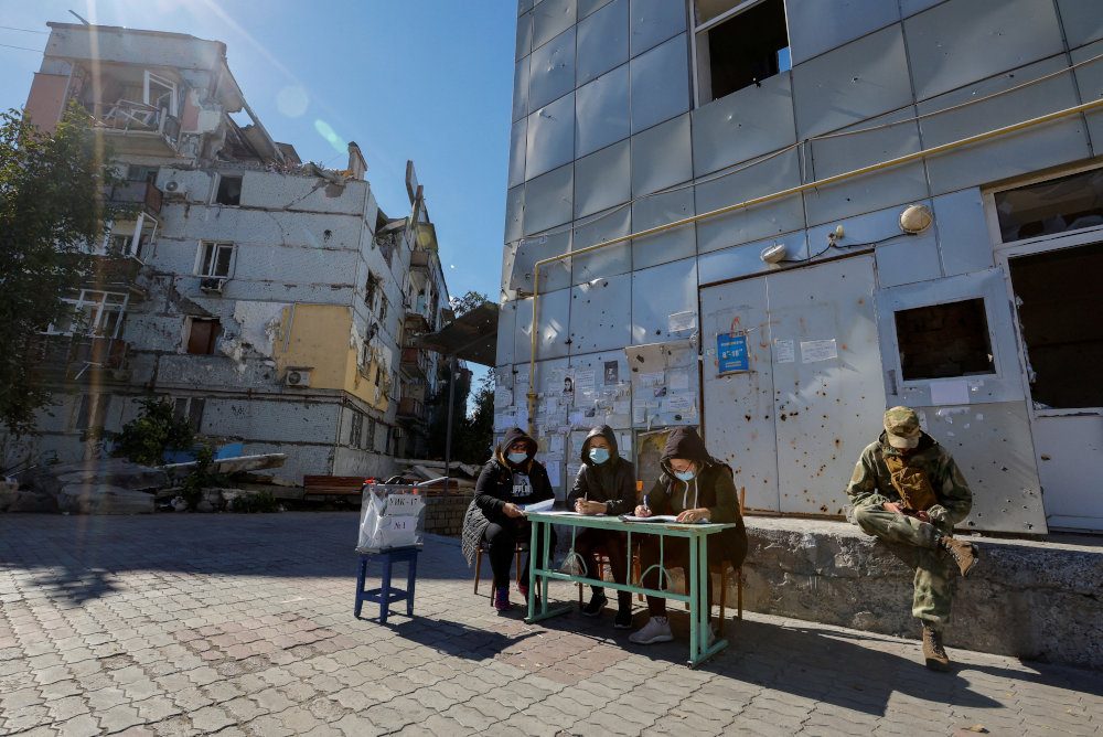 Ukraine says referendum voting door-to-door under Russian-backed security