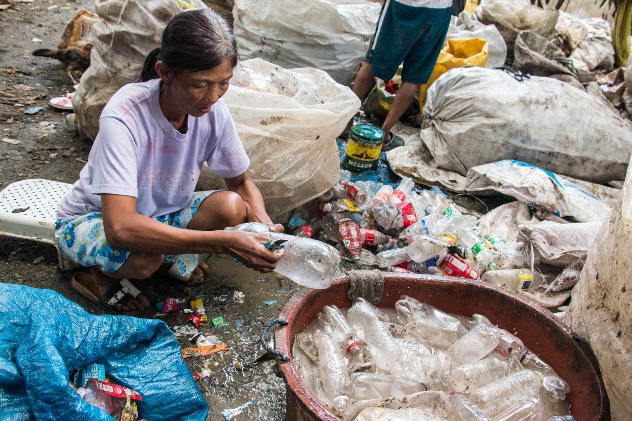 In informal waste work, women are twice as vulnerable, invisible