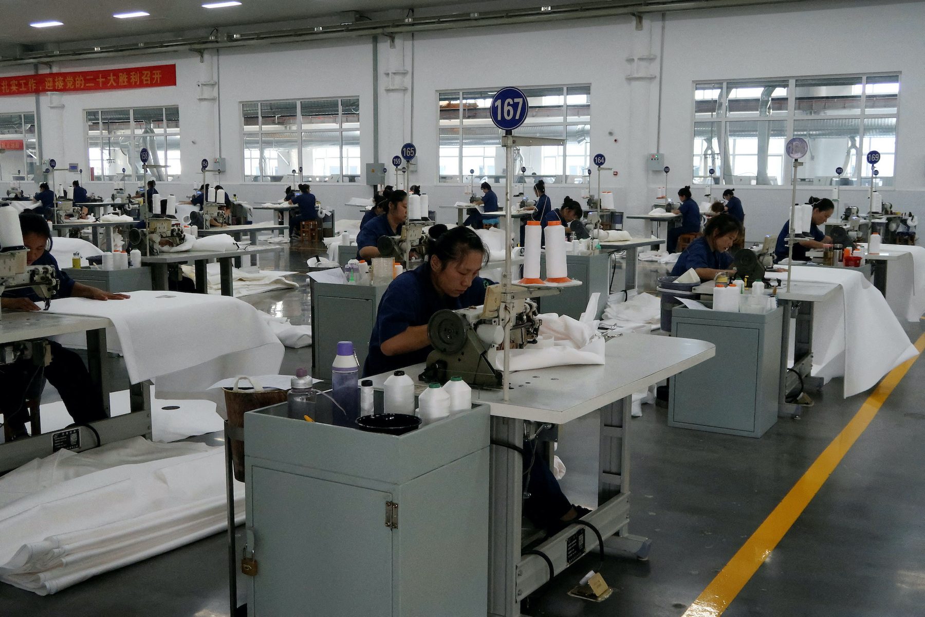 Factory output weakens on widespread slowdown, China COVID-19 curbs