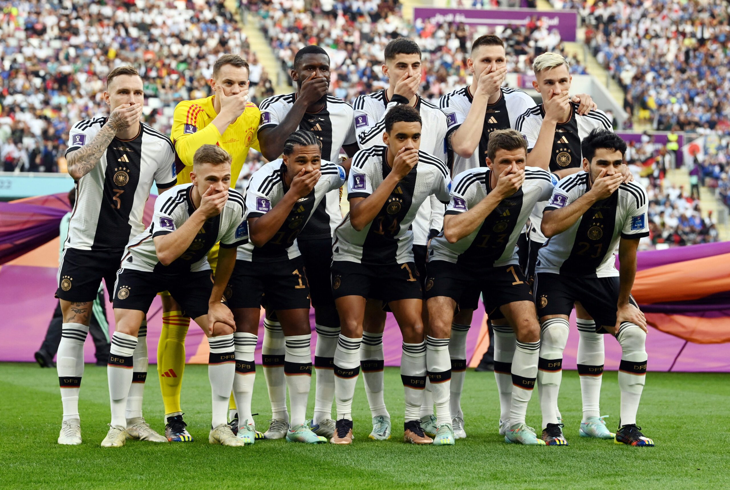 Germany players cover mouths in team photo amid armband row