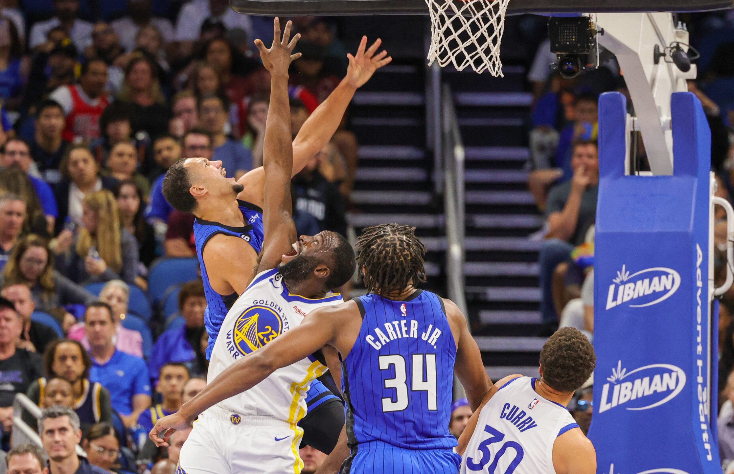 Jalen Suggs helps Magic stave off road-weary Warriors