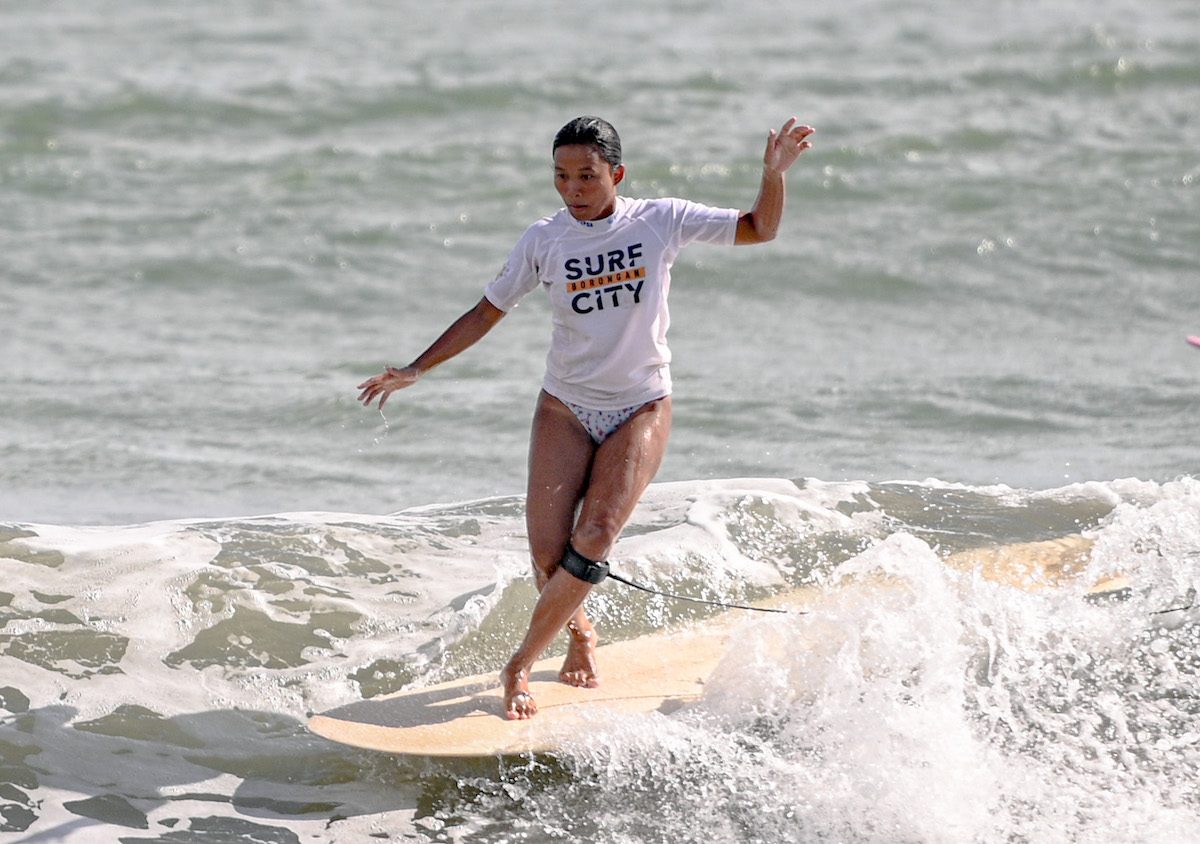 Aping Agudo emerges women’s longboard champ in Ilocos Sur surfing tilt