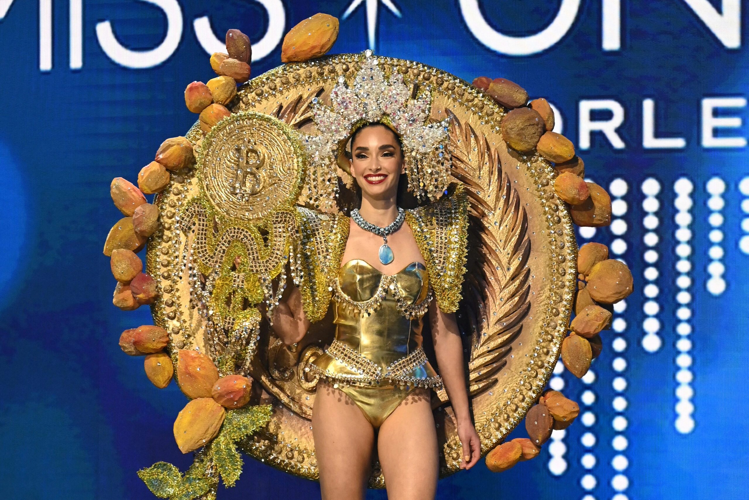 LOOK: Miss El Salvador dons golden bitcoin outfit at Miss Universe 2022 beauty pageant