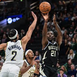 Holiday picks up slack as Giannis-less Bucks rout Pacers