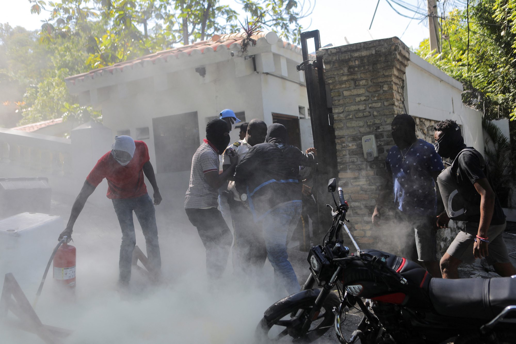 Haiti police block streets, break into airport to protest officer killings