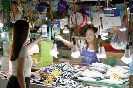 Philippine public markets, tricycle drivers embrace digital