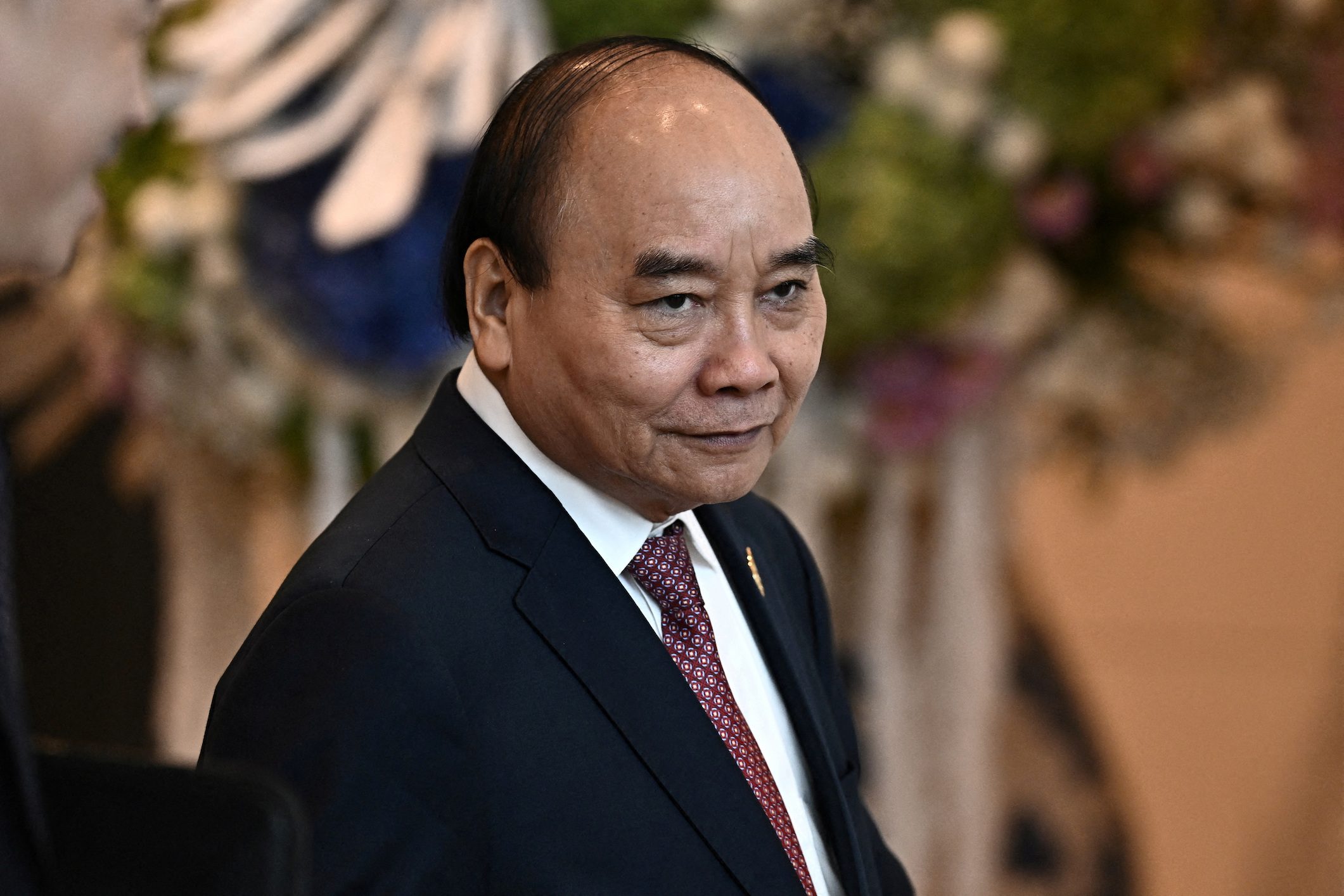 Vietnam’s President Phuc quits, blamed for ministers’ ‘violations’
