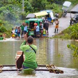 Weeks of misery: Basey relief workers cross rivers in makeshift floats