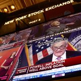 Stocks rally, dollar slumps after Fed statement, Powell remarks
