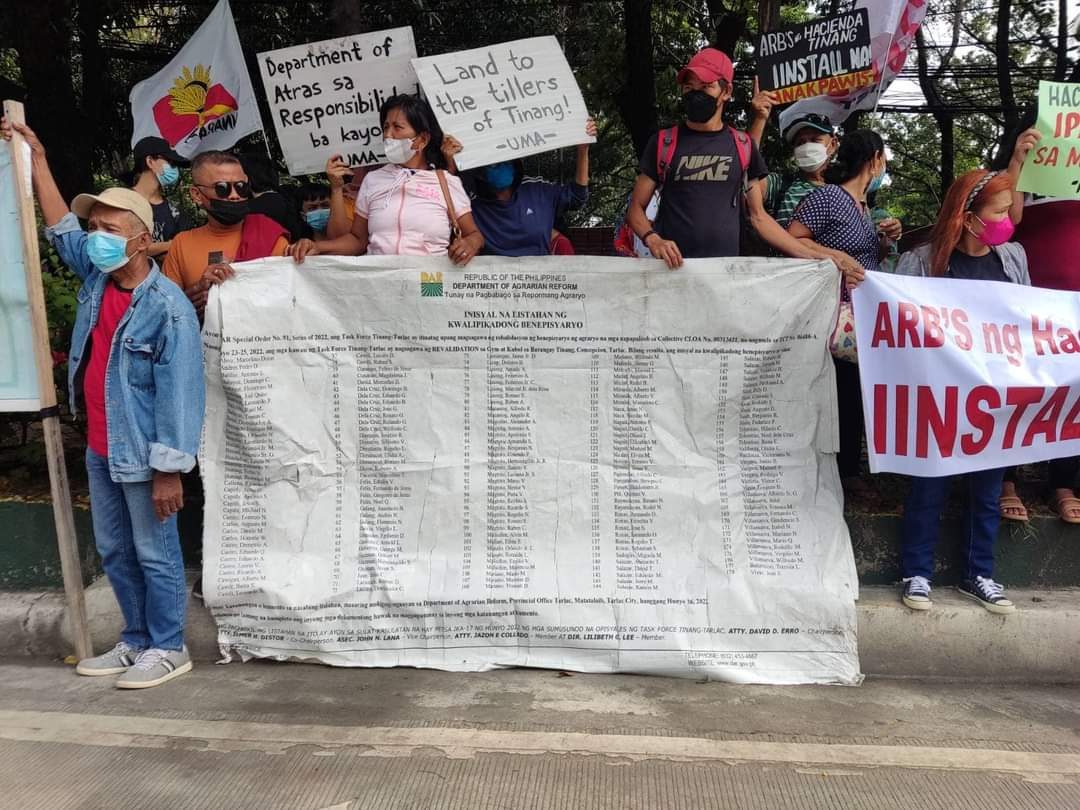 Hacienda Tinang farmers protest third revalidation of farmer beneficiaries