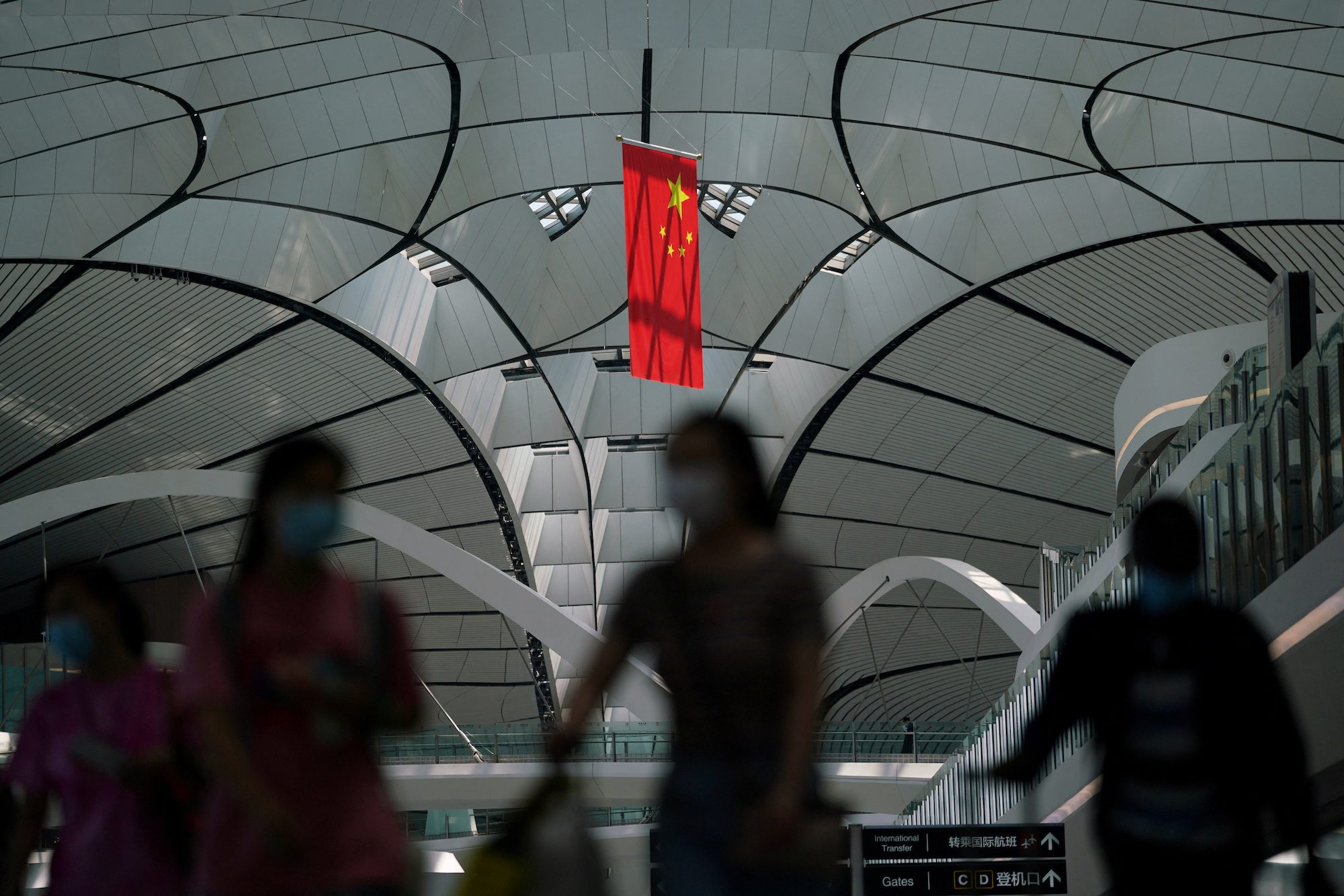 China to fully reopen borders to foreigners but near-term hurdles remain