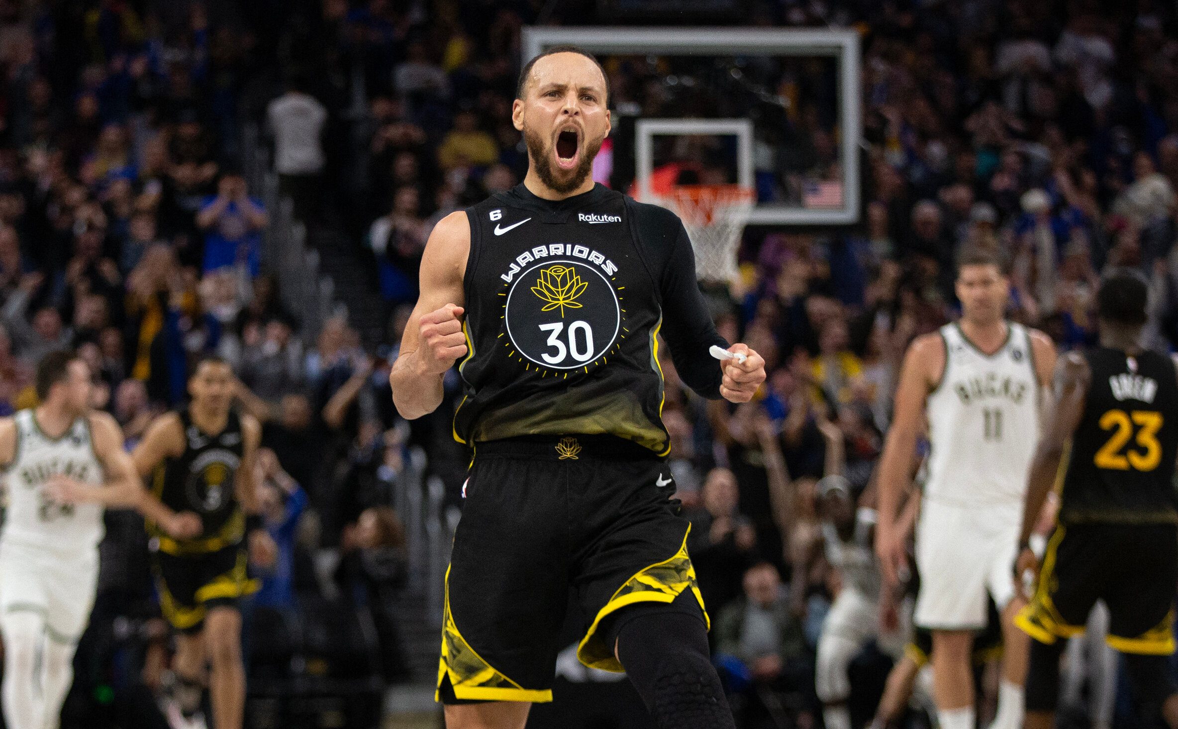Stephen Curry’s late burst rallies Warriors past Bucks in OT